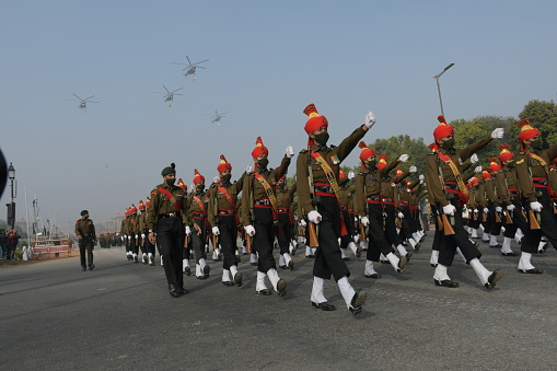 New Delhi 20 January 2021 : Indian soldiers and Air Force helicopter participate in a rehearsal for upcoming Republic Day parade in New Delhi, India. 20 January 2021