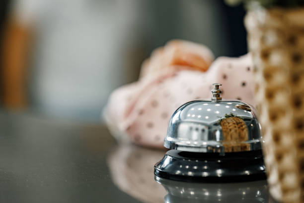 istock Hotel service bell on front desk counter 1297552413