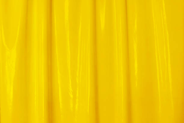 gelb glatt glänzend abstrakte elegante flüssige hintergrund. latex, lack, lackwelle. - latex fotos stock-fotos und bilder