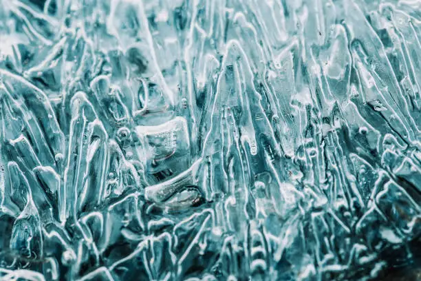Macro close-up of frozen water - ice crystals in the light