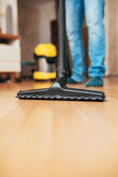 istock Home cleaning with a vacuum cleaner 1297553904