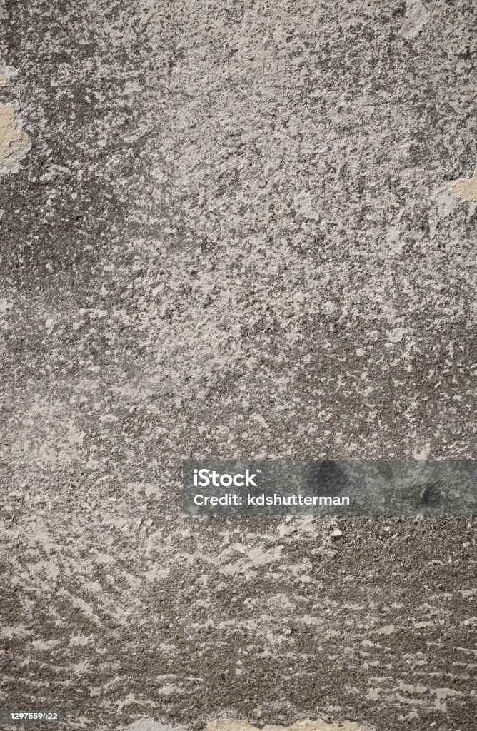 An old grunge texture, gray concrete wall with spotted surface for background. Abstract Stock Photo