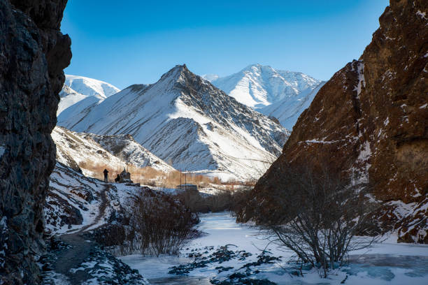 Frozen River in Hemis National Park, Ladakh, India Frozen River in Winter in Hemis National Park, Ladakh, Jammu and Kashmir, India. This nationalpark is home of Snow Leopards and is located between 3,000 and 6,000 m altitude in the state of Jammu and Kashmir, Northern India. frozen river stock pictures, royalty-free photos & images