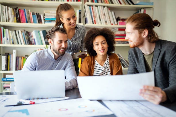 istock Creative managers crew working with new startup project in office. Team brainstorming. 1297561811