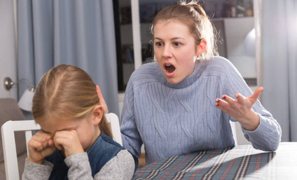 istock Woman scolding her daughter 1297565506