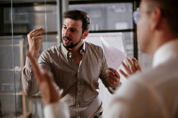 istock Colleagues in conference room making a business plan. 1297565801