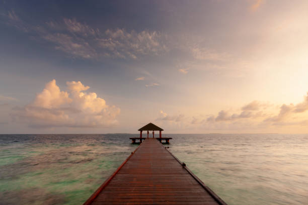 istock Maldives Pier Spectacular Sunrise 1297566747