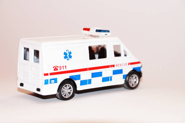 istock 911 rescue toy car on white background, copy space 1297566902