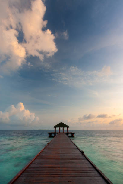 istock Maldives Pier Spectacular Sunrise 1297567078