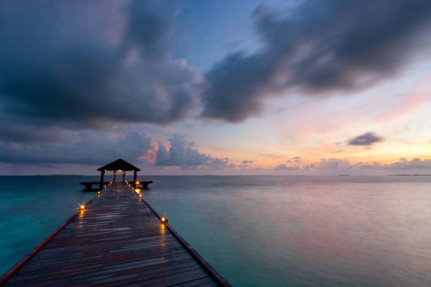 istock Maldives Pier Spectacular Sunrise 1297568214