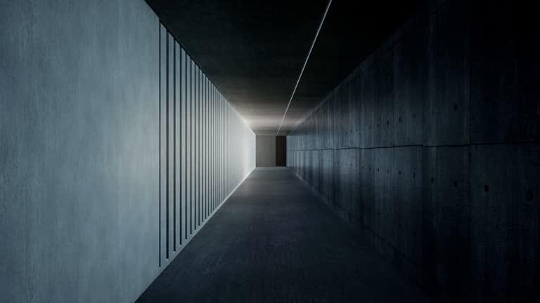 Rays of sunlight fall through the concrete columns on the wall