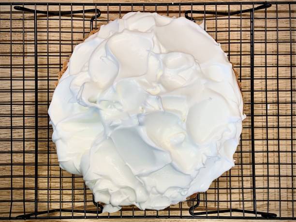 Unbaked homemade lemon meringue pie (tart)