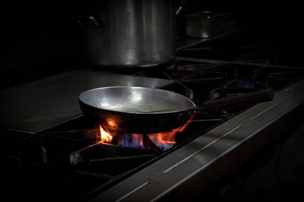 istock Frying pan ready  on flame  to cook Indian food 1297580609