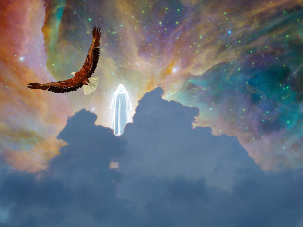 istock Rising.Figure in shining cloak and eagle 1297581453