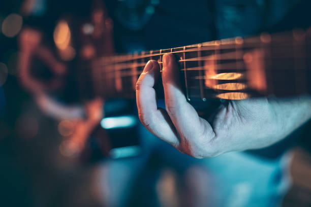 istock Guitarist close up 1297584986