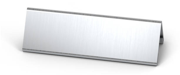 istock Silver table top desk name plate for office isolated on white background. 3d illustration. 1297585131