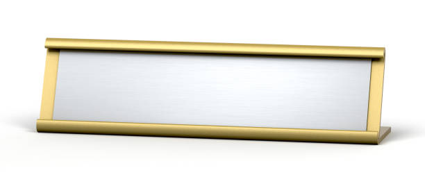istock Golden and silver table top desk name plate for office isolated on white background. 3d illustration. 1297585194