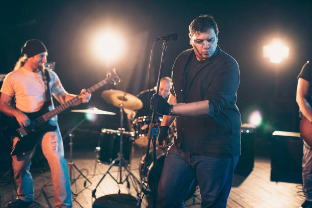 istock Rock and roll band rehearsal 1297586321
