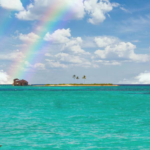 istock A small island in the indian ocean with a rainbow 1297588192
