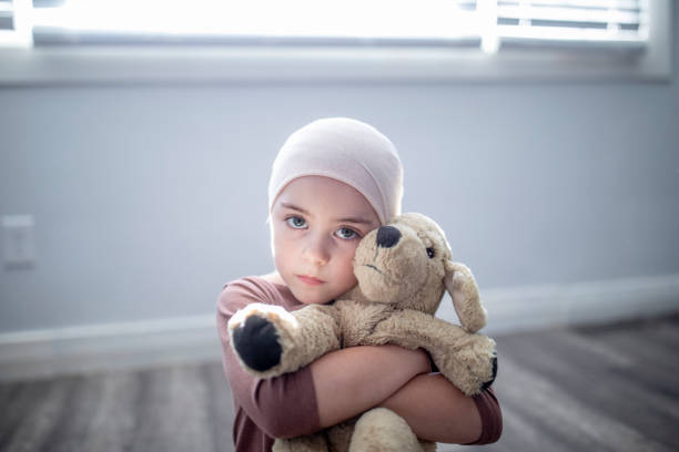 istock Young girl with cancer 1297589024