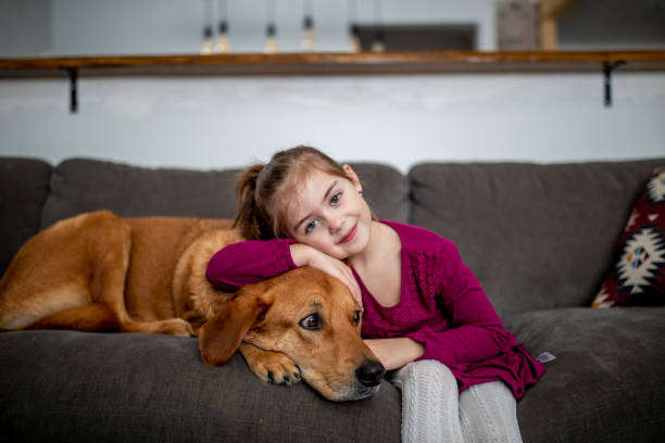 istock Young girl and her dog 1297589650