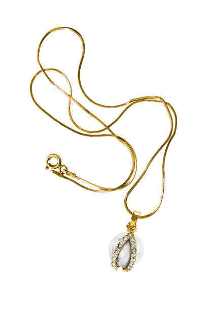 istock Gold necklace isolated 1297591427