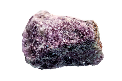 Lepidolite, closup of the mineral cut out on a white background