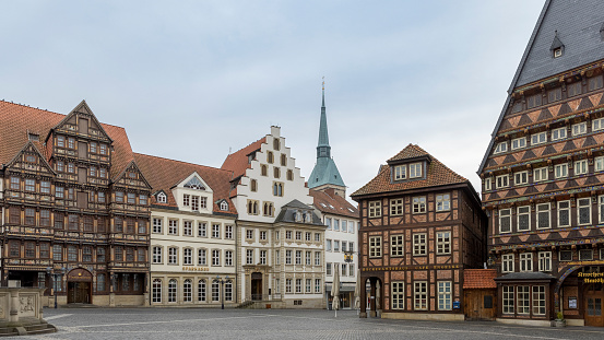 Hildesheim, Germany - jan 17th 2021: Old town square with half-timbered buildings in Hildesheim is a famous travel destination as soon as coronavirus lockdown is lifted.