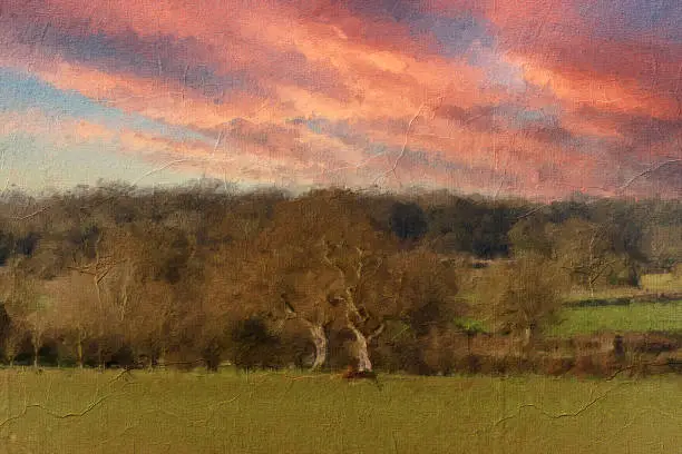 Oil painting and sketch of a view across the English countryside with dramatic sunset, created by Michael Gane