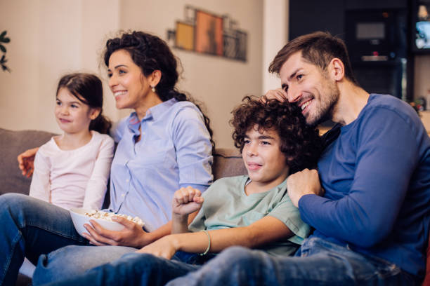 istock Family enjoying with the exciting TV program 1297597975