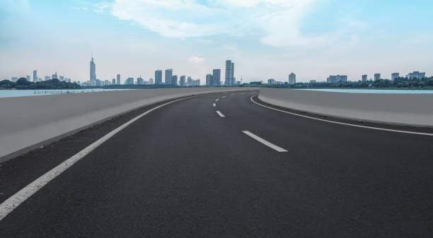 istock Highway and financial district architectural landscape 1297598268