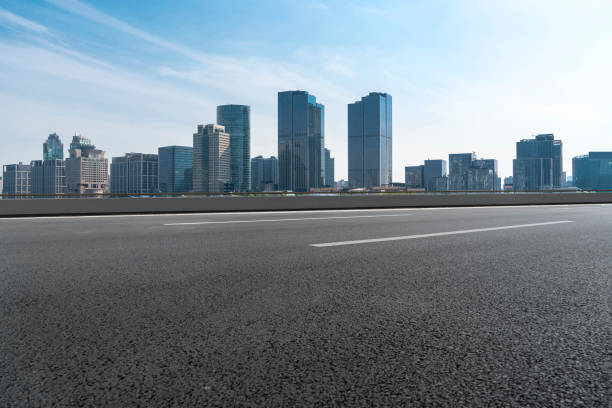 istock Urban road and financial district architectural landscape 1297599107
