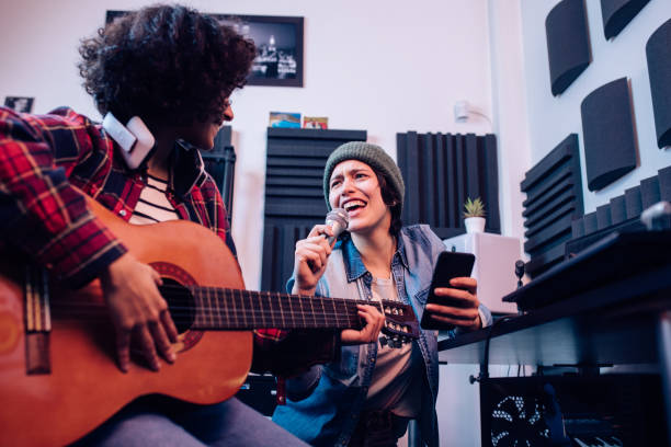 istock Two musicians composing a new song together 1297599149