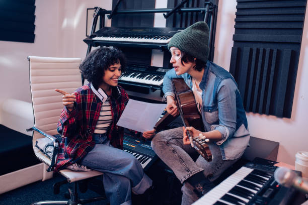 istock Two musicians writing a new song 1297599153