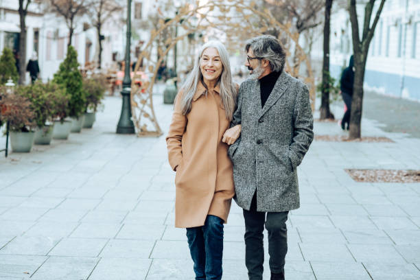 istock Happy mature couple walking and enjoying 1297599285