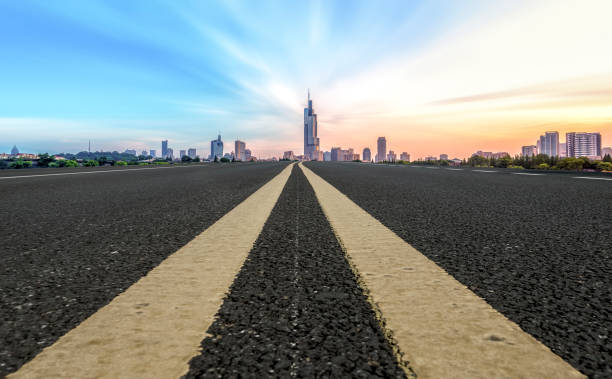 istock Highway and financial district architectural landscape 1297599339