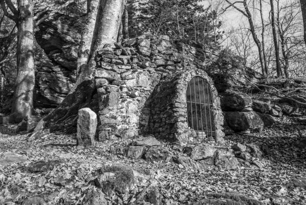 istock Black and White image Old stone built dilapidated monastery ruin on the Rusel and Ruselabsatz near Geisslinger Stein Koenigstein and Hausstein in the Bavarian Forest near Deggendorf and Regen, Germany 1297602010