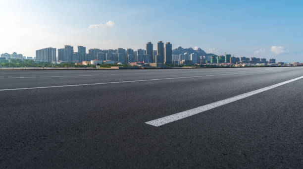 istock Urban road and financial district architectural landscape 1297602063