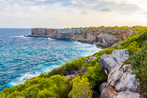 Cliffs and bay landscape panorama of Parc natural de Mondragó in Mallorca Balearic Islands Spain.