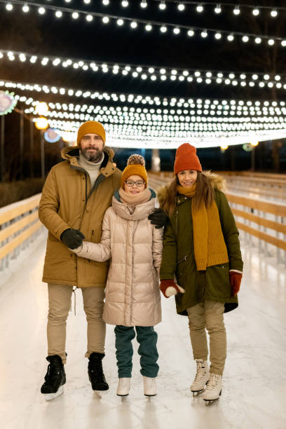 istock Family on skating rink 1297603925