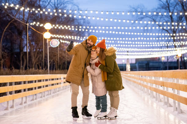 istock Family making selfie portrait on rink 1297603958
