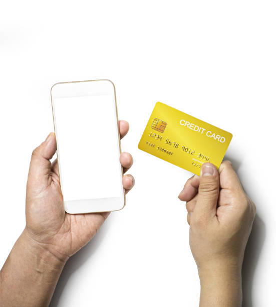 istock Person is holding a mobile phone and credit card. 1297606372