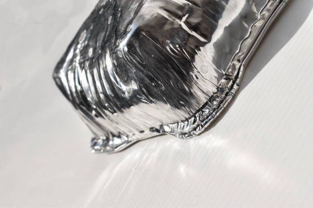 istock aluminum foil tray on white background with copy space 1297607560