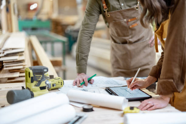 istock Designing some woodwork at the carpentry 1297608438