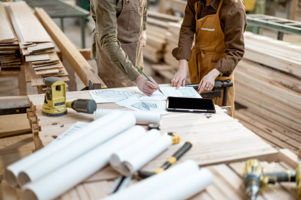 istock Designing some woodwork at the carpentry 1297609047