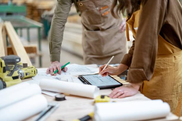 istock Designing some woodwork at the carpentry 1297609347