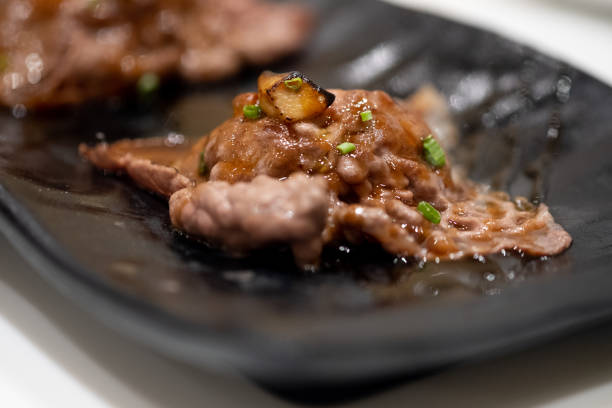 Sushi wagyu beef burned with sweet sauce. Selective focus