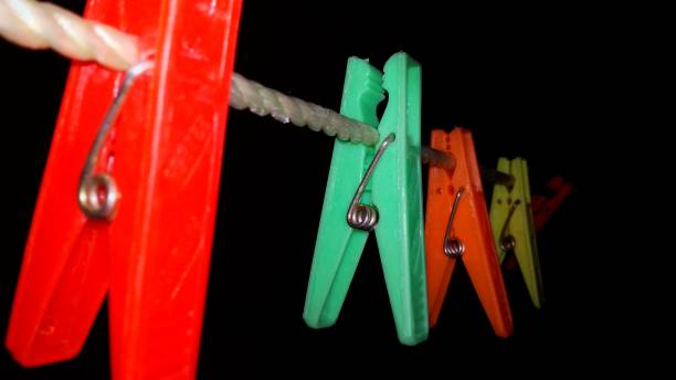 istock Multicolored plastic cloth clip/Clothespin photo 1297614143