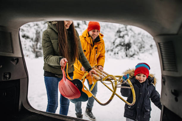 istock Family going to have some fun with sleds on snow 1297615796