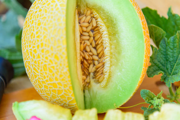 istock Fresh green melon on wood plate 1297616292